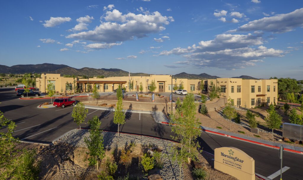 view of the parking lot and apartment building